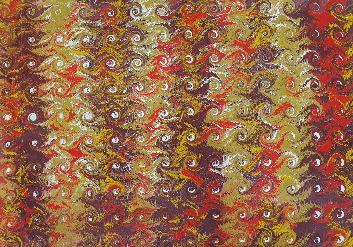 Handgemachtes marmoriertes Papier NT004 mit Doppelwirbel-Muster in Rot und Ocker – einzigartiges Ebru-Papier.